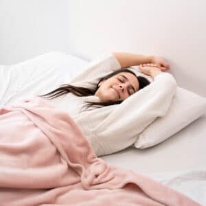 a lady laying in bed